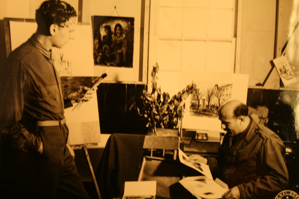 German POW artist Franz Wischnewski, with Der Ruf production editor Curt Vinz sitting (Edward Davison Papers, Yale University Library)