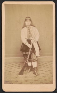 Kady Brownell posing with a rifle, probably in New York City (Library of Congress)